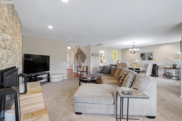 7250 SW Arbor Lake Dr, Wilsonville, OR 97070 - carpeted living room with a chandelier, a textured ceiling, and recessed lighting