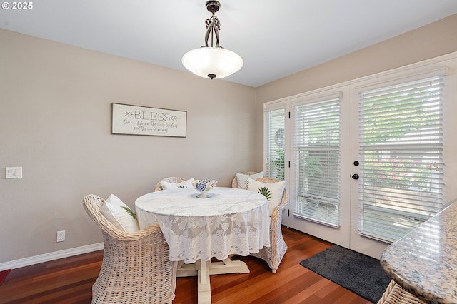 7250 SW Arbor Lake Dr, Wilsonville, OR 97070 - dining room featuring wood finished floors, french doors, and baseboards