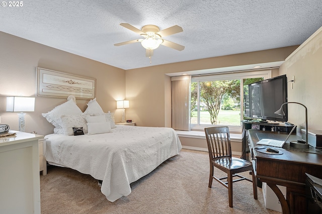 7250 SW Arbor Lake Dr, Wilsonville, OR 97070 - bedroom with light colored carpet, an office area, a textured ceiling, and ceiling fan