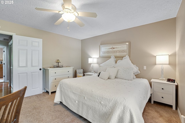 7250 SW Arbor Lake Dr, Wilsonville, OR 97070 - bedroom featuring light carpet, a textured ceiling, and ceiling fan