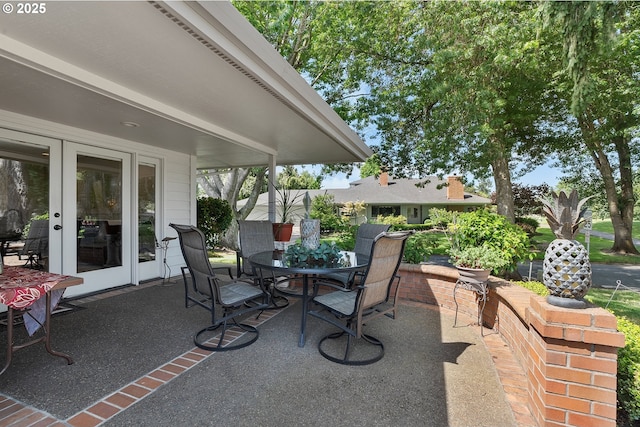 7250 SW Arbor Lake Dr, Wilsonville, OR 97070 - view of patio / terrace featuring outdoor dining space and french doors