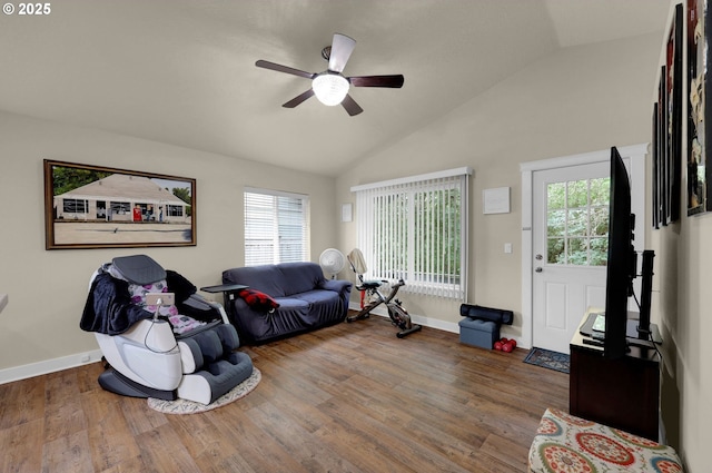 25246 Corky Ln, Veneta, OR 97487 - living area with vaulted ceiling, a ceiling fan, and wood finished floors