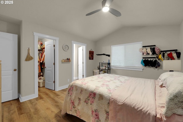 25246 Corky Ln, Veneta, OR 97487 - bedroom with vaulted ceiling, a spacious closet, light wood finished floors, and a ceiling fan