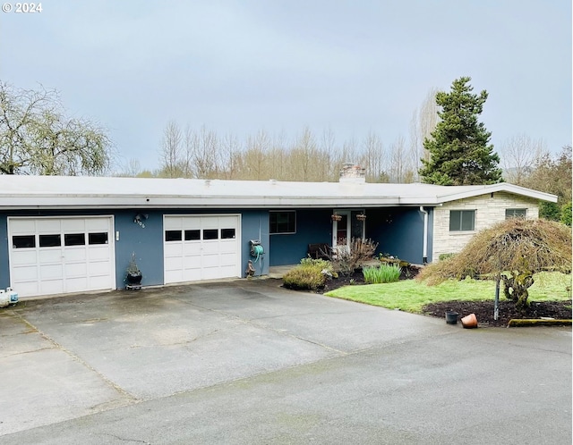 1520 Main St, Forest Grove, OR 97116 - ranch-style home featuring a chimney, driveway, and an attached garage
