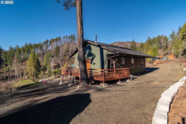 view of front of house with a deck