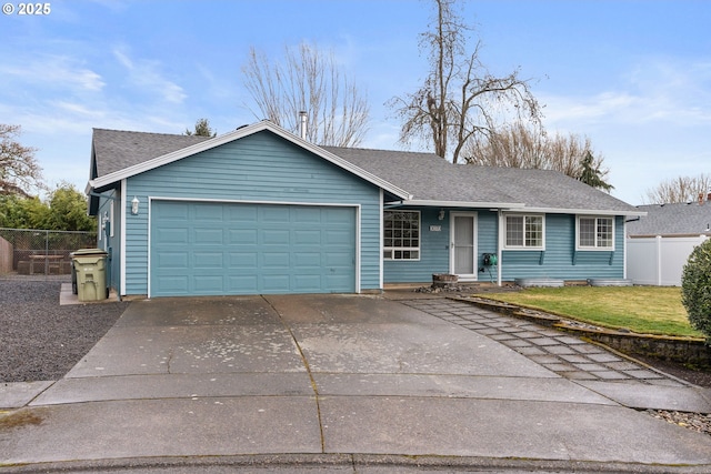 ranch-style house featuring a garage and a front yard