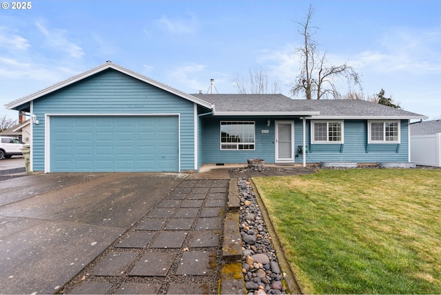 ranch-style home with a garage and a front yard