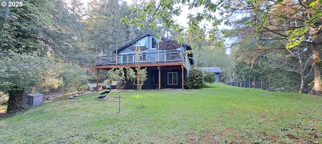 62760 Koski Rd, Coos Bay, OR 97420 - rear view of property with a yard, a wooden deck, and a view of trees