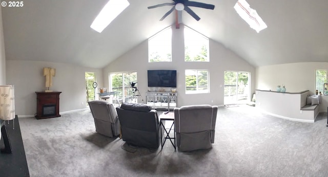 62760 Koski Rd, Coos Bay, OR 97420 - living room featuring carpet floors, a ceiling fan, high vaulted ceiling, and baseboards