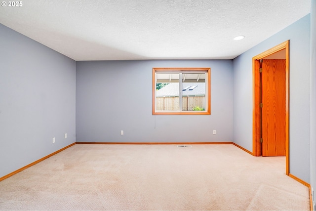7236 Woodcrest Ct, Keizer, OR 97303 - carpeted empty room featuring baseboards and a textured ceiling