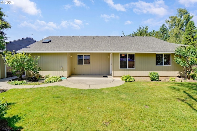 7236 Woodcrest Ct, Keizer, OR 97303 - rear view of house with a patio area, roof with shingles, and a yard