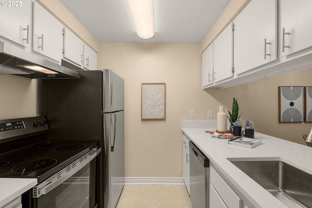 kitchen with white cabinetry, stainless steel appliances, and sink