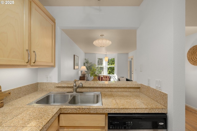 1500 SW Park Ave Unit 429, Portland, OR 97201 - kitchen featuring tile countertops, light brown cabinetry, a sink, and dishwasher