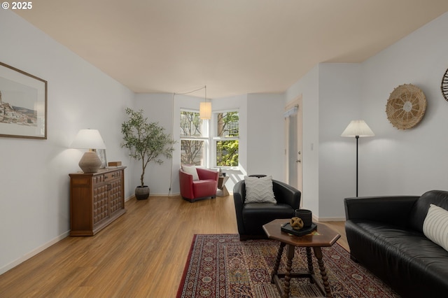 1500 SW Park Ave Unit 429, Portland, OR 97201 - living room featuring wood finished floors and baseboards