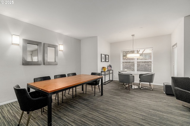 1500 SW Park Ave Unit 429, Portland, OR 97201 - dining space with dark carpet and baseboards