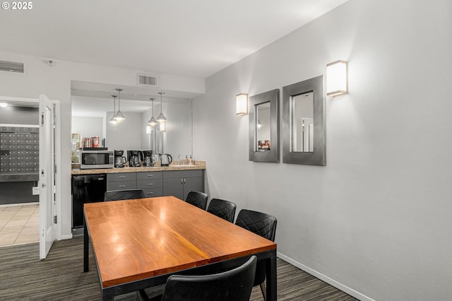 1500 SW Park Ave Unit 429, Portland, OR 97201 - dining space featuring baseboards and mail area