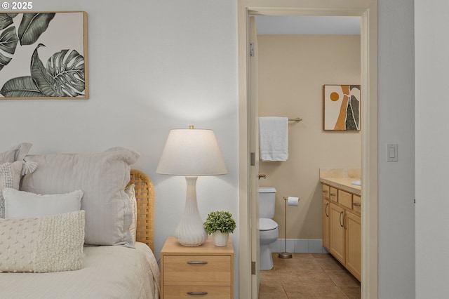 1500 SW Park Ave Unit 429, Portland, OR 97201 - bedroom with light tile patterned floors and baseboards
