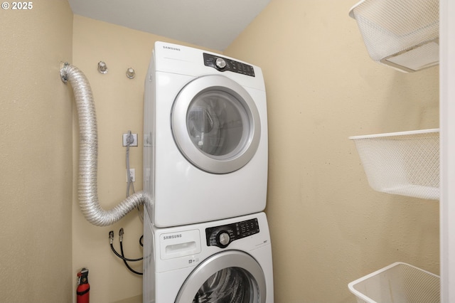 1500 SW Park Ave Unit 429, Portland, OR 97201 - laundry area featuring estacked washer and dryer