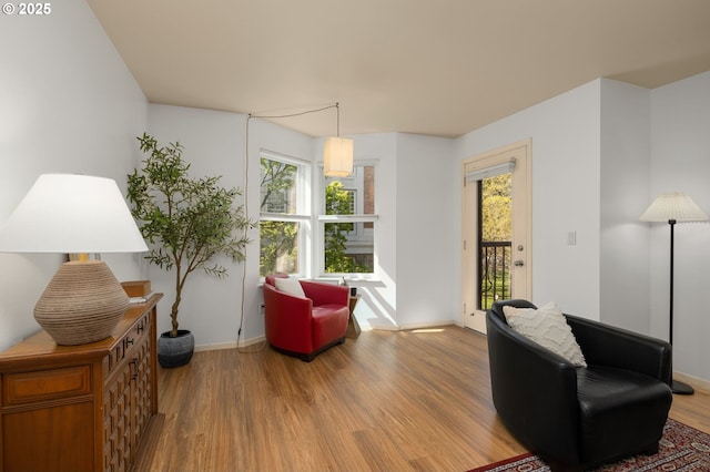 1500 SW Park Ave Unit 429, Portland, OR 97201 - living area featuring wood finished floors and baseboards