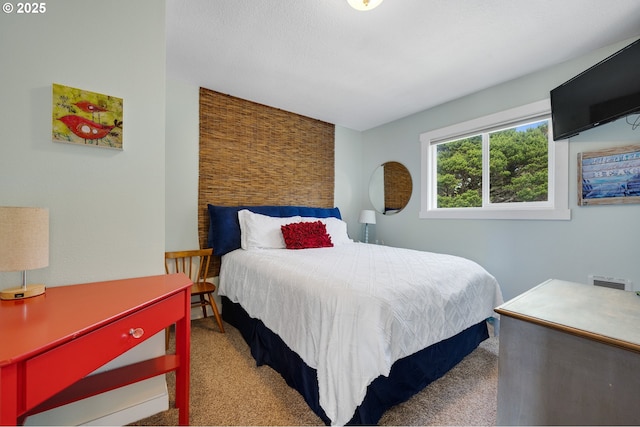 bedroom with light colored carpet