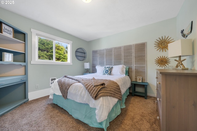 bedroom with dark carpet