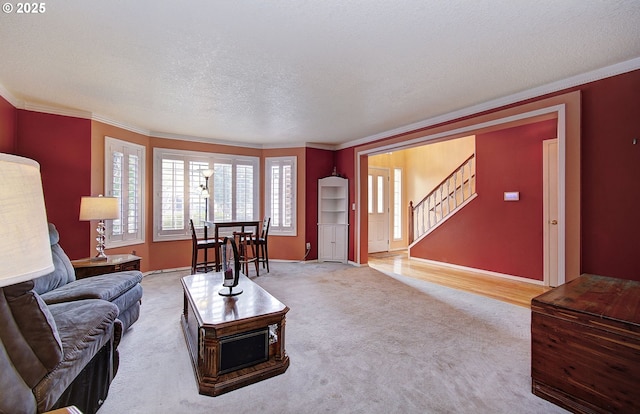 10535 SW 135th Ave, Beaverton, OR 97008 - carpeted living room featuring crown molding, stairway, and a textured ceiling