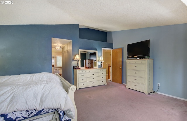 10535 SW 135th Ave, Beaverton, OR 97008 - bedroom with vaulted ceiling, carpet flooring, and a textured ceiling