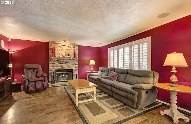 10535 SW 135th Ave, Beaverton, OR 97008 - living area featuring a textured ceiling, hardwood / wood-style flooring, and a fireplace