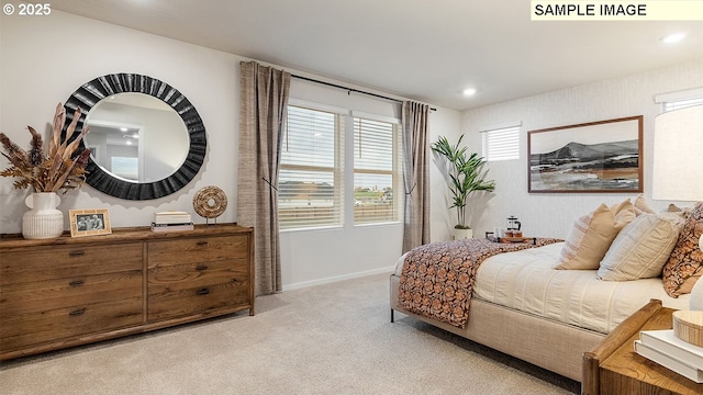 bedroom featuring recessed lighting, light colored carpet, and baseboards