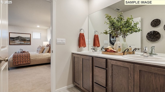 full bath featuring double vanity, visible vents, ensuite bath, and a sink