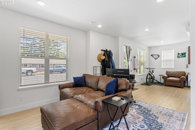 7557 N Gilbert Ave, Portland, OR 97203 - living area with light wood-style flooring and recessed lighting