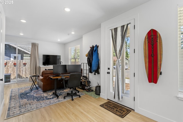 7557 N Gilbert Ave, Portland, OR 97203 - home office with wood finished floors and recessed lighting