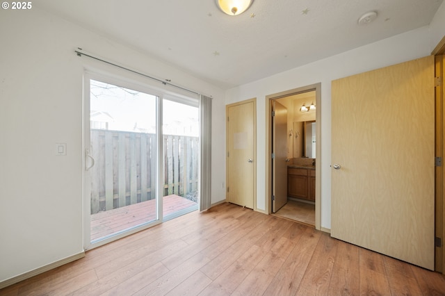 unfurnished room featuring light hardwood / wood-style flooring