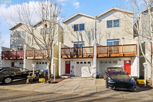 view of front facade featuring a garage and a deck