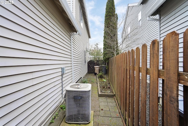 view of property exterior with central air condition unit