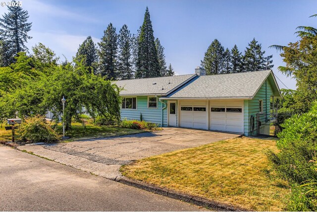 14385 SW Hargis Rd, Beaverton, OR 97008 - ranch-style house with a garage, driveway, a chimney, a front yard, and a shingled roof