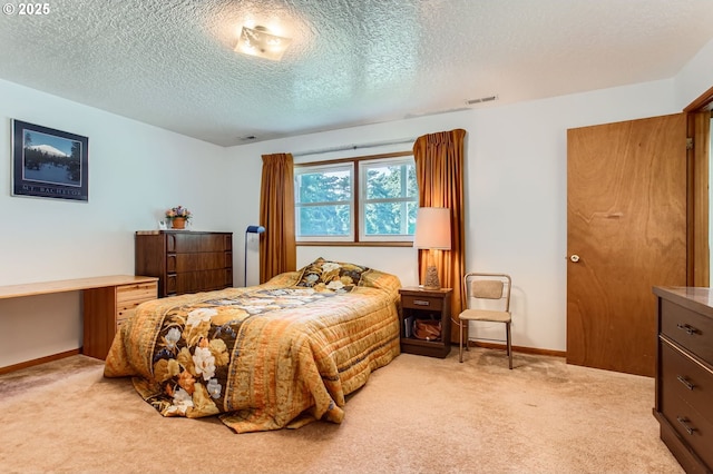14385 SW Hargis Rd, Beaverton, OR 97008 - bedroom with light carpet and a textured ceiling