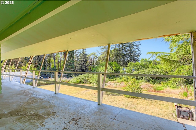 14385 SW Hargis Rd, Beaverton, OR 97008 - unfurnished sunroom featuring view of wooded area