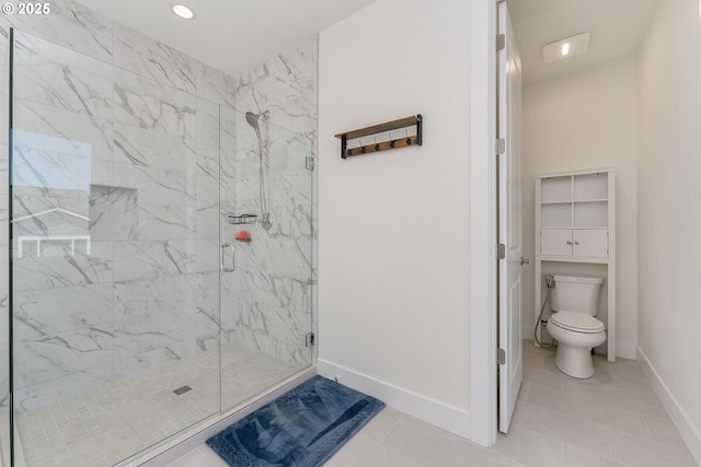 15875 NW Ridgeline St, Portland, OR 97229 - bathroom featuring a marble finish shower, tile patterned flooring, and recessed lighting
