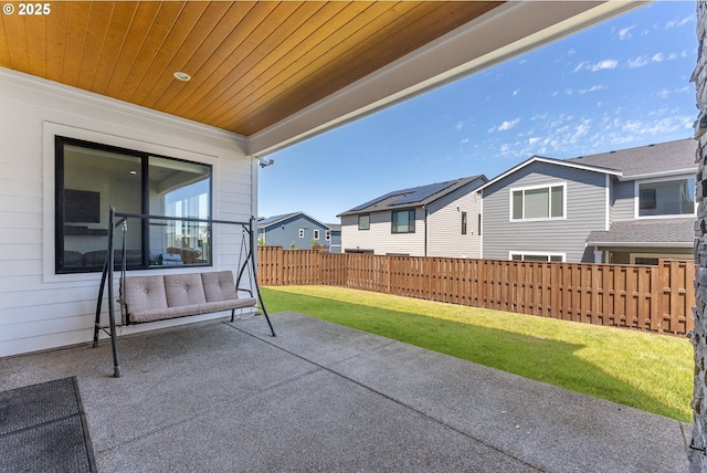 15875 NW Ridgeline St, Portland, OR 97229 - fenced backyard with a patio and a residential view