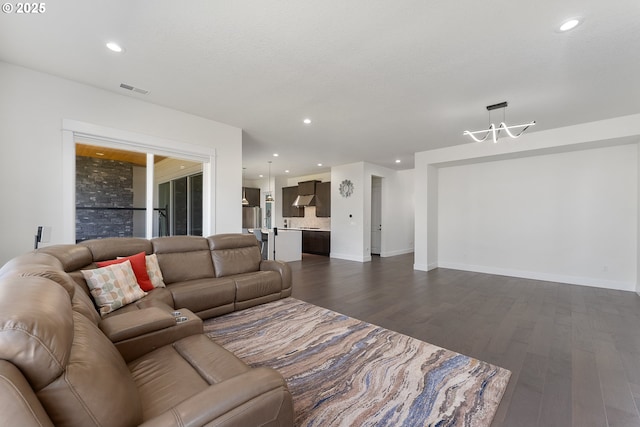 15875 NW Ridgeline St, Portland, OR 97229 - living area with a chandelier, dark wood-style floors, and recessed lighting