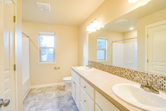 full bath featuring toilet, visible vents, decorative backsplash, and a sink