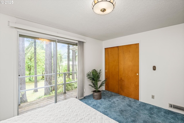 82091 Lost Valley Ln, Dexter, OR 97431 - carpeted bedroom featuring a textured ceiling