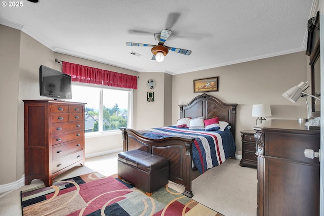 bedroom featuring crown molding, baseboards, and light carpet
