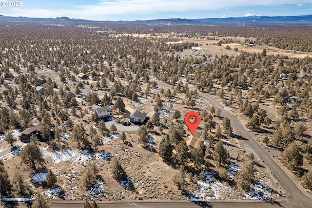 bird's eye view with a mountain view