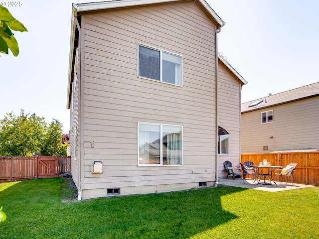 1091 56th St, Washougal, WA 98671 - back of property with a patio area and crawl space