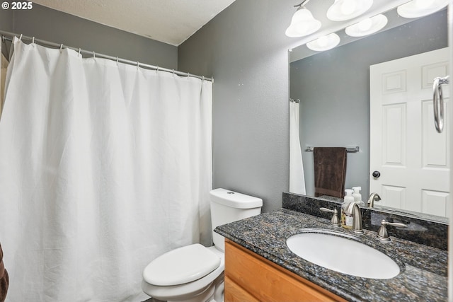 503 NW Hertel St, Hillsboro, OR 97124 - bathroom featuring toilet, vanity, and curtained shower