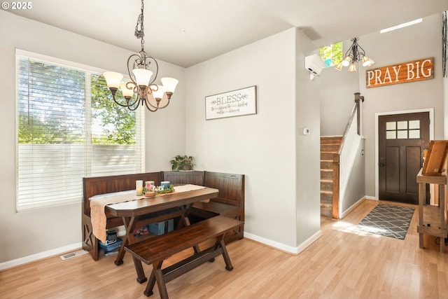 503 NW Hertel St, Hillsboro, OR 97124 - dining space with a chandelier, light wood-type flooring, and baseboards