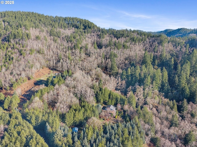 aerial view featuring a view of trees