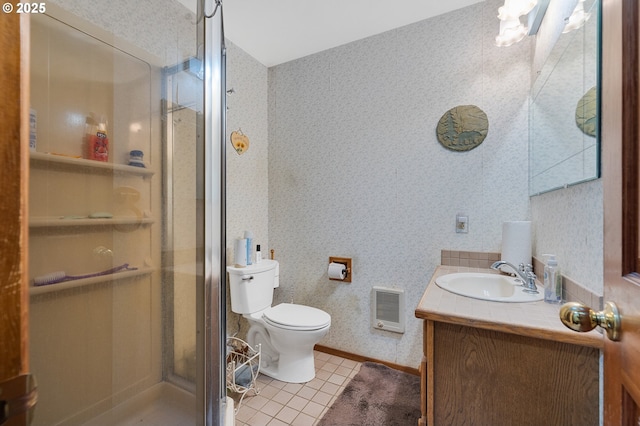 bathroom with vanity, tile patterned flooring, a shower stall, and wallpapered walls